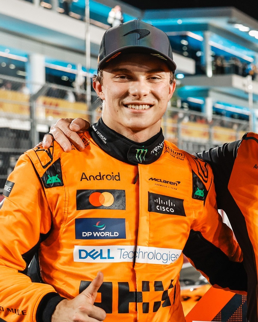 Oscar Piastri, McLaren F1 Team, 1st position, Zak Brown, CEO, McLaren Racing, and Lando Norris, McLaren F1 Team, 2nd position, celebrate after the Sprint